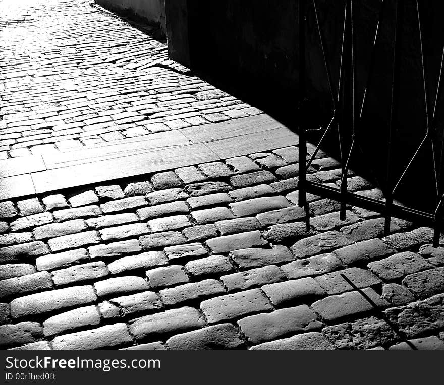 Stone road and old  gate