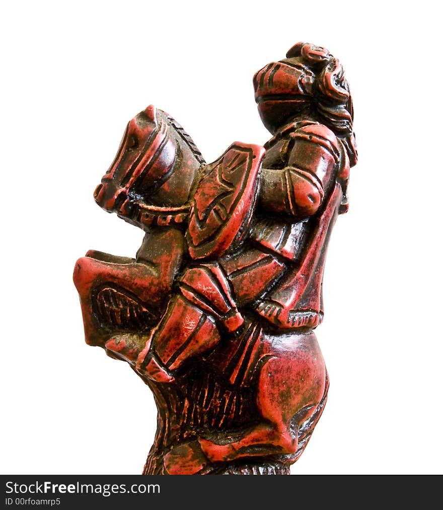 Close up of a red knight chess piece