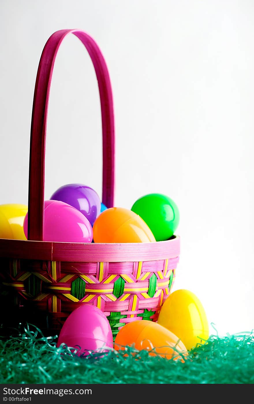 Easter egg basket with colored eggs. Easter egg basket with colored eggs