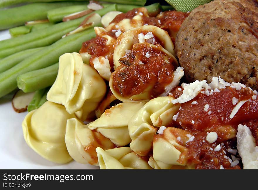 Tortellini and Meatballs with Sauce