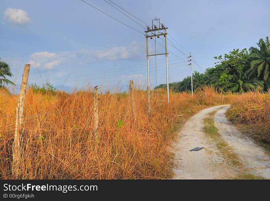 A dusty road through the countryside. A dusty road through the countryside