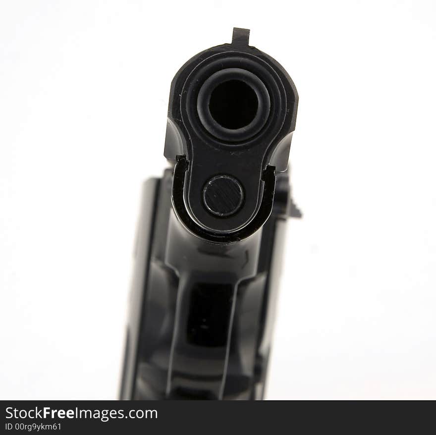 9mm pistol isolated on white background.