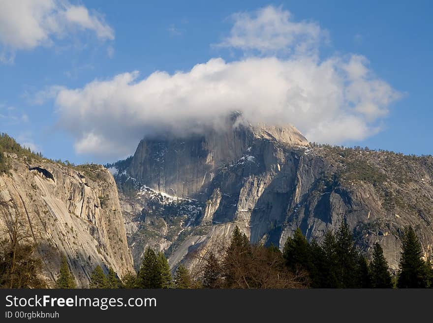 Half Dome covered in fog in Yosemite National park close-up