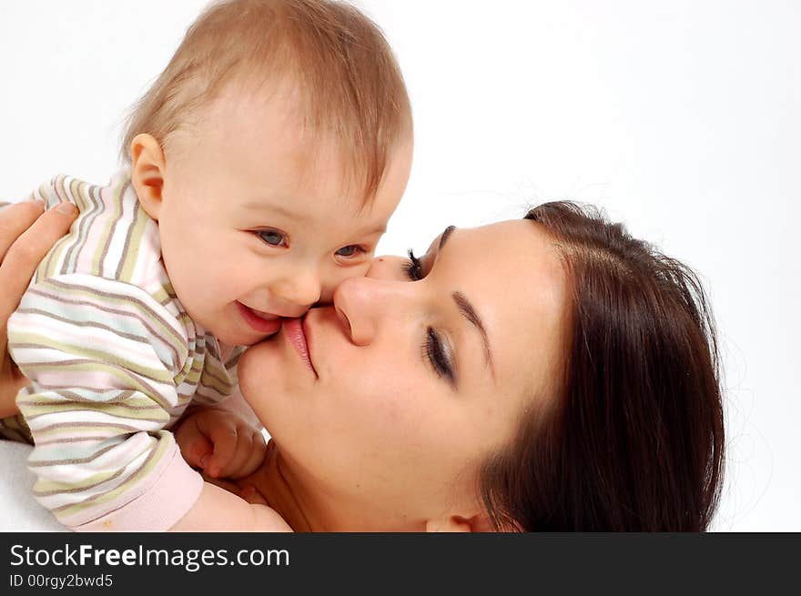 Happy mother holding her baby. Happy mother holding her baby