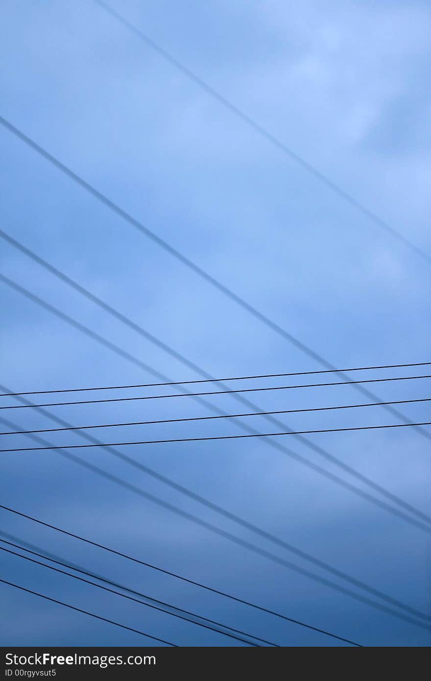 Blue sky with crosses of lead wires. Blue sky with crosses of lead wires