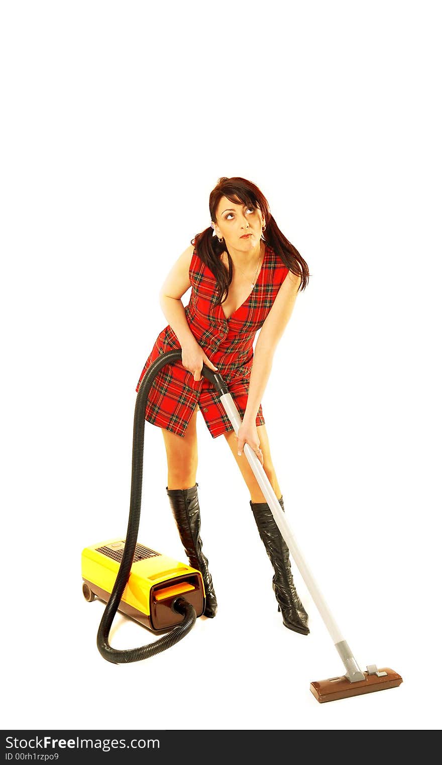 Woman with a vacuum cleaner. Woman with a vacuum cleaner