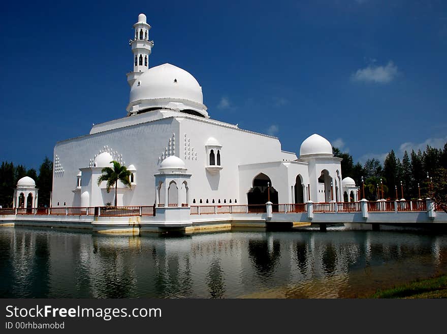 Flouting mosque on the blue sky background