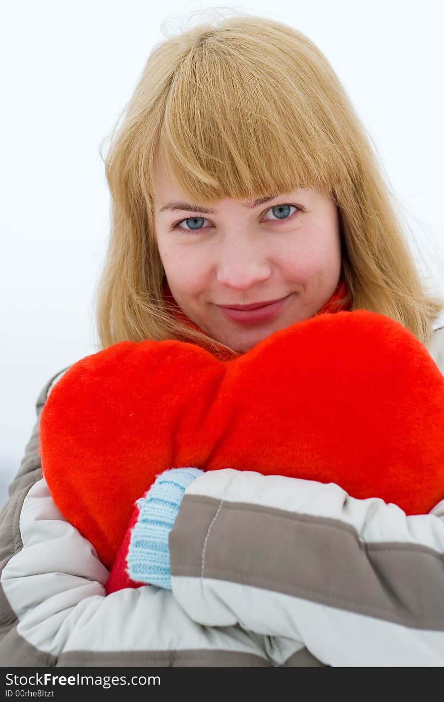 Young girl outdoor with red heart. Young girl outdoor with red heart