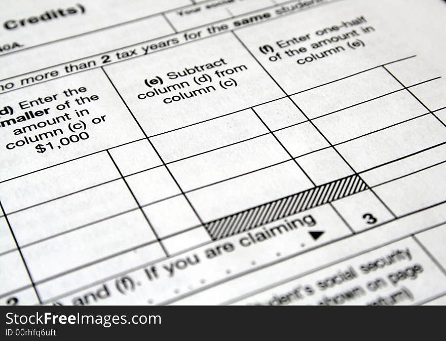 Close-up of a white tax form ready to be filled out. Close-up of a white tax form ready to be filled out