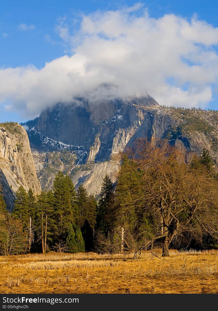 Half Dome covered in fog in Yosemite