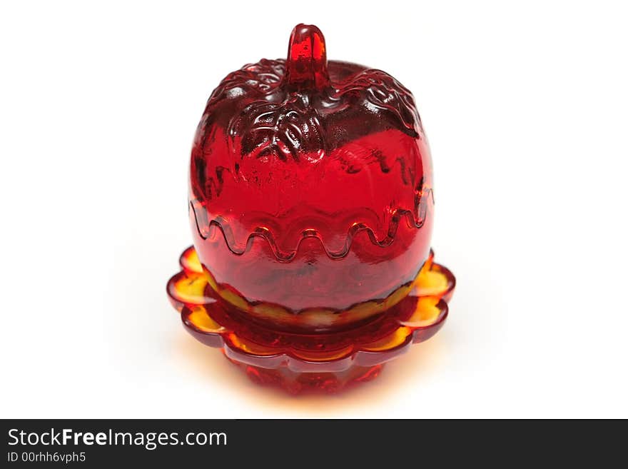 Red glass souvenir on the white background