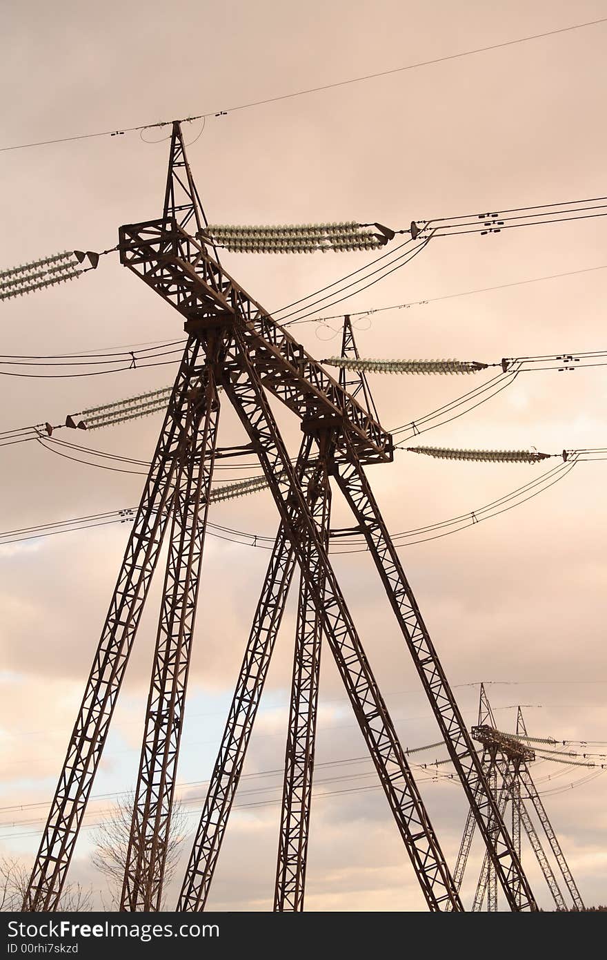 Power transmission line on coloured sky background. Power transmission line on coloured sky background