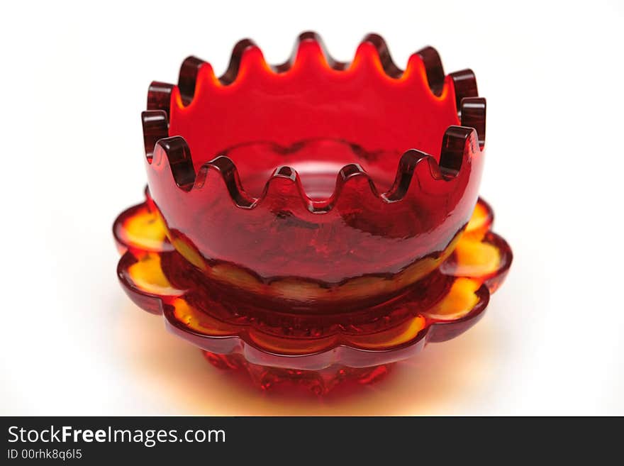 Red glass souvenir on the white background