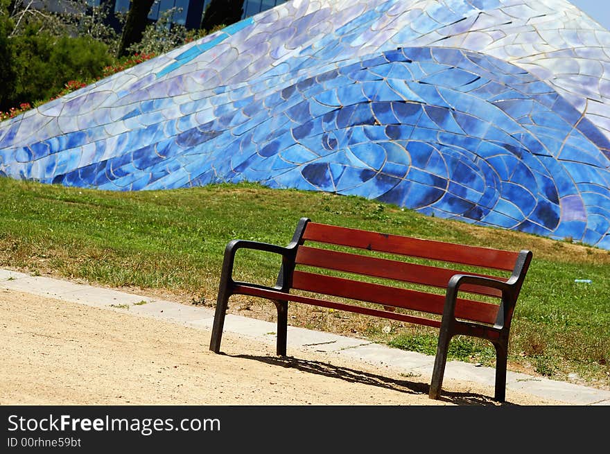 A bench in a barcelonian park. A bench in a barcelonian park