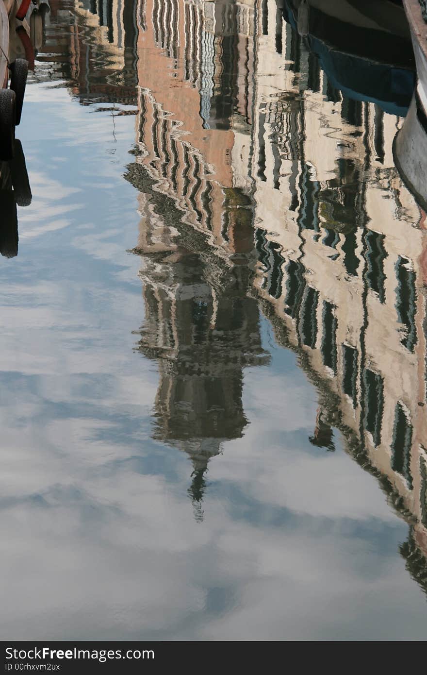 A reflection on a canal of Venice - Italy. A reflection on a canal of Venice - Italy