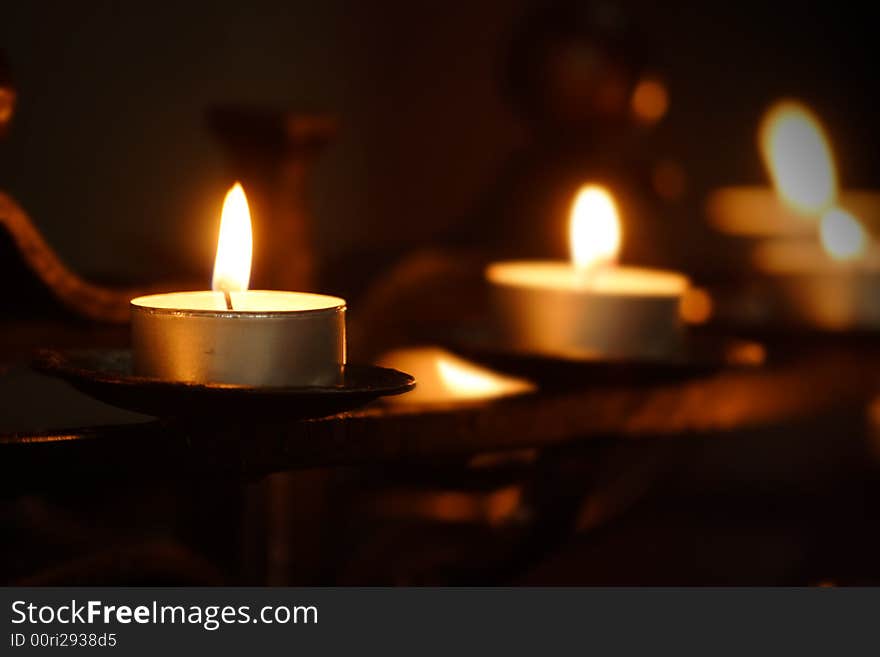 Small candles in rows in a church