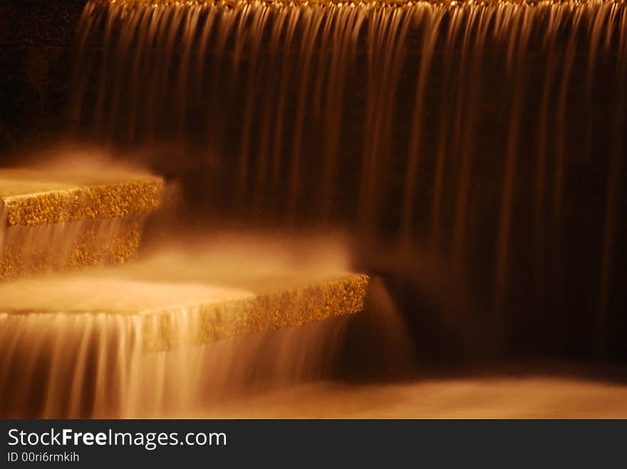 waterfall under light