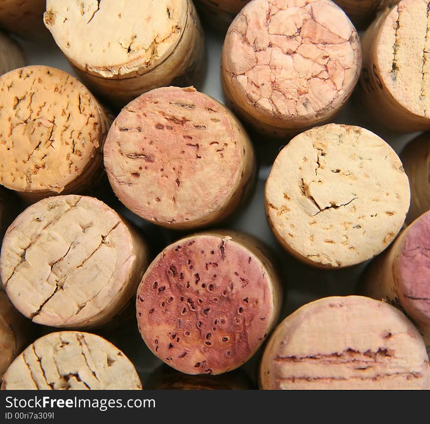 Close-up shot of the tops of a pile of wine corks. Close-up shot of the tops of a pile of wine corks