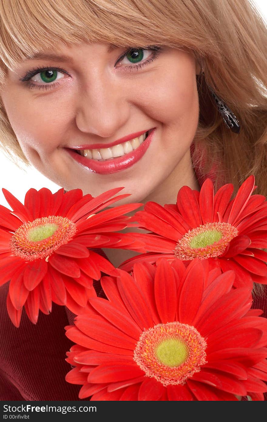 A young girl with three flowers. A young girl with three flowers