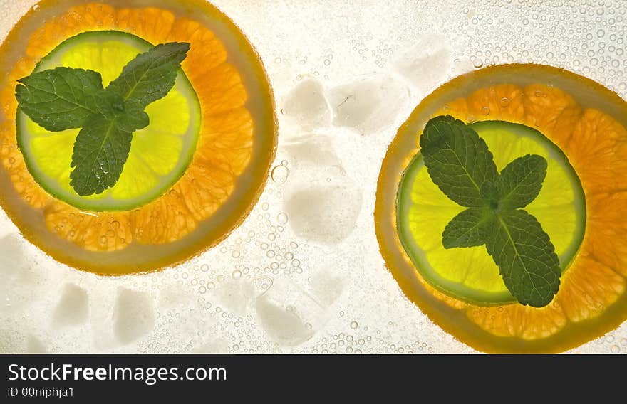 Lime and orange segments whith mint