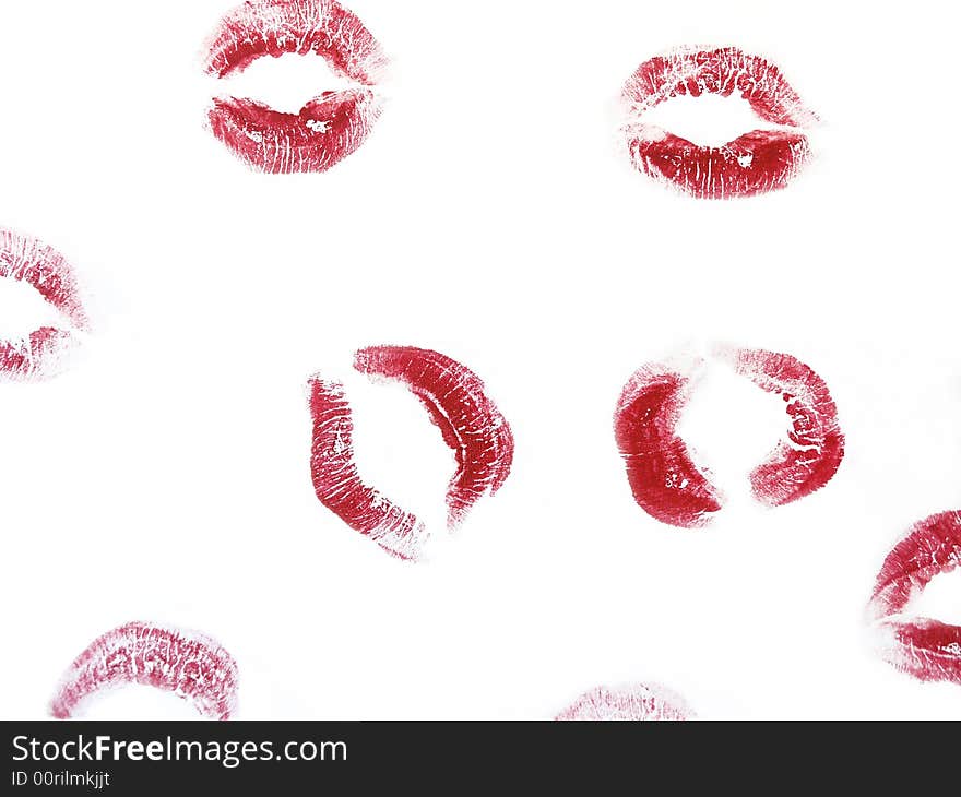 Random red kisses on a white