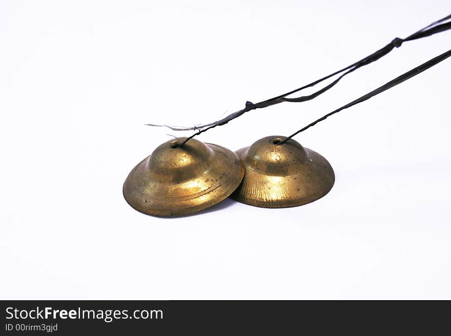 Two copper buddhist bells isolated on white. Two copper buddhist bells isolated on white