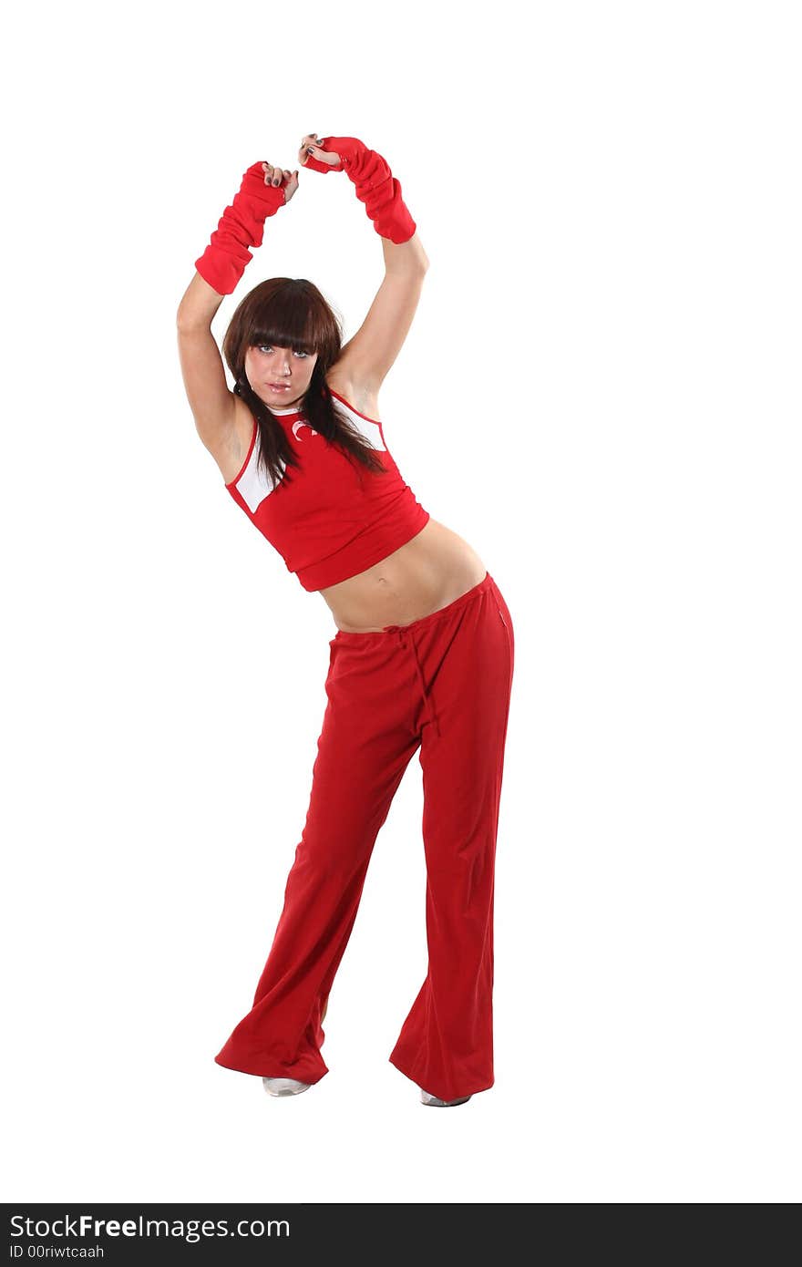 The beautiful girl dances in a red suit. The beautiful girl dances in a red suit