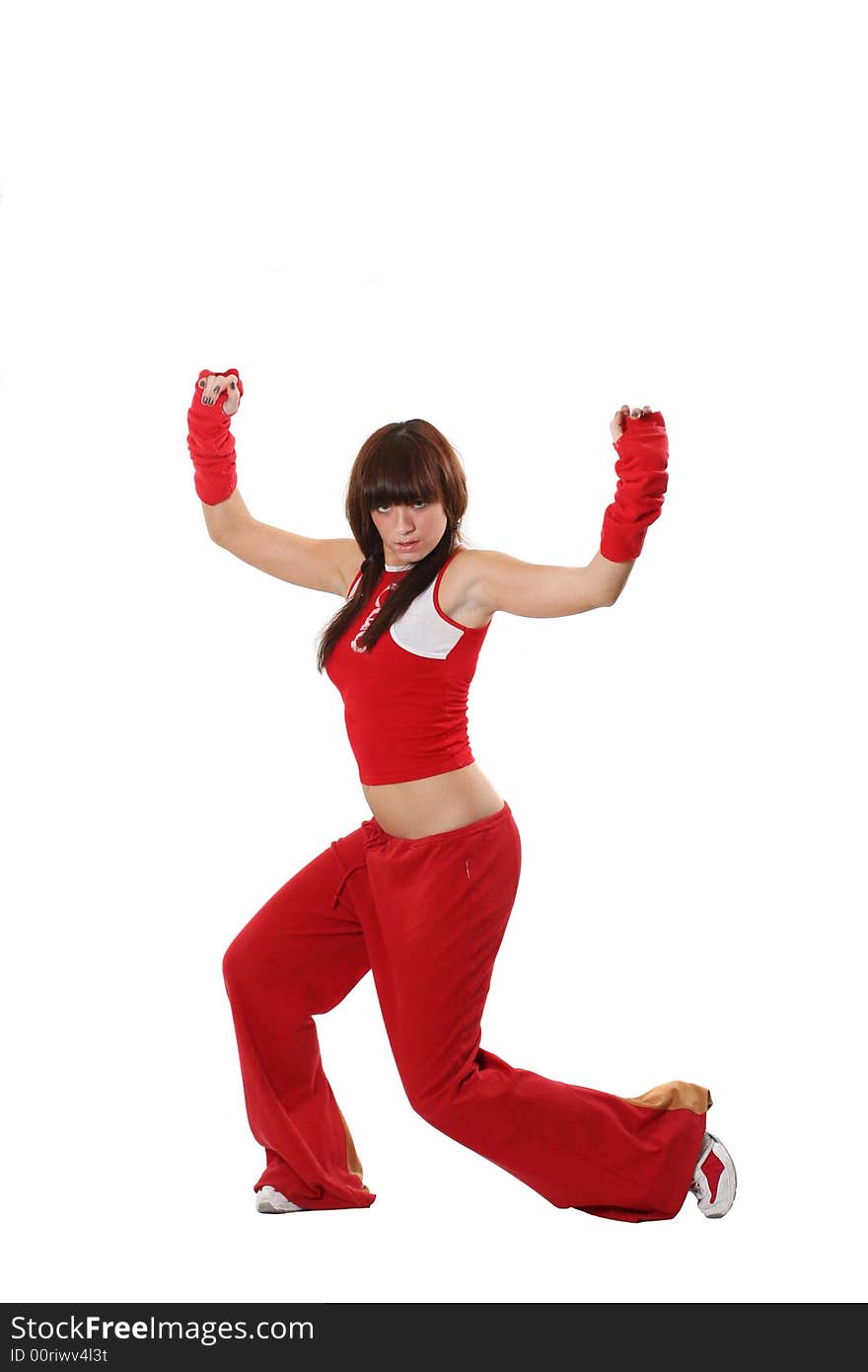 The beautiful girl dances in a red suit. The beautiful girl dances in a red suit