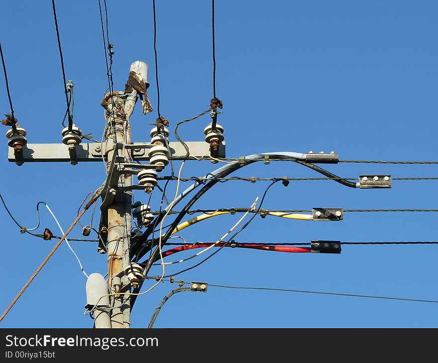 Four phase electrical connection at the top of a muncipal electrical pole. Four phase electrical connection at the top of a muncipal electrical pole