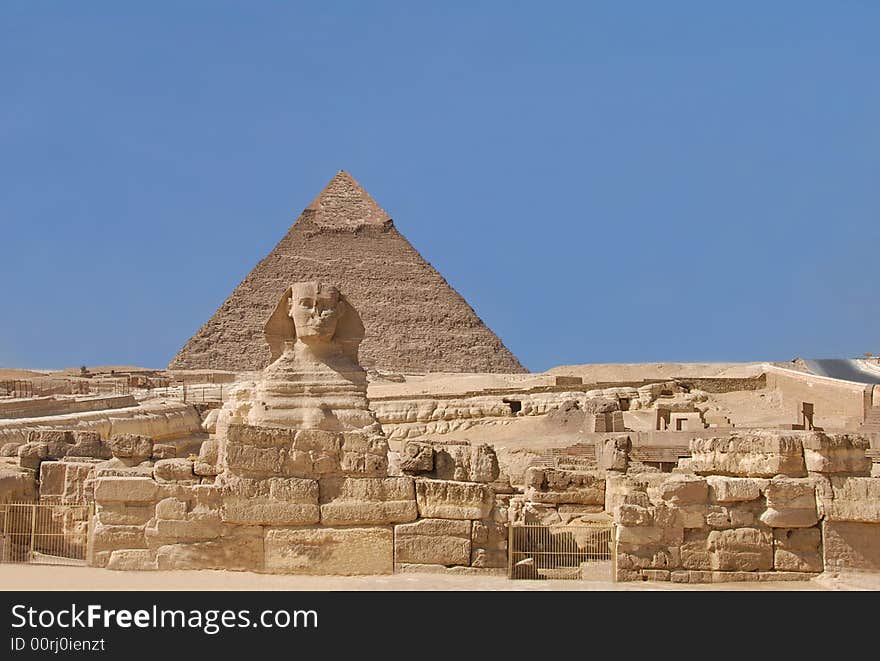 The Sphinx, the Chephren pyramid and ruins of temple complex. The Sphinx, the Chephren pyramid and ruins of temple complex