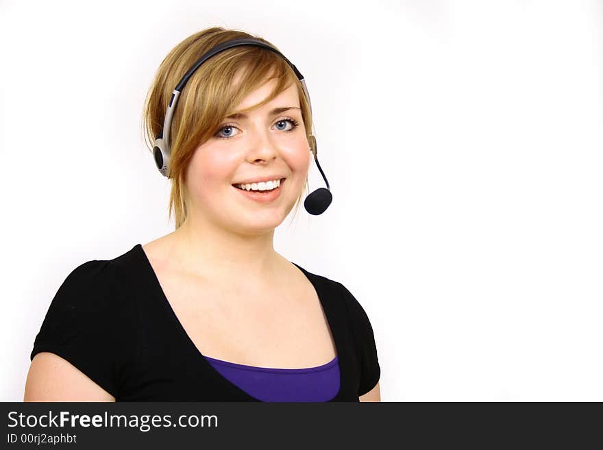 Portrait of beautiful smiling telephone operator with headset. Portrait of beautiful smiling telephone operator with headset