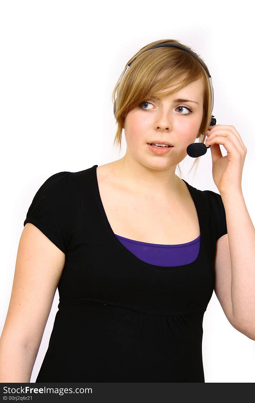 Portrait of beautiful smiling telephone operator with headset. Portrait of beautiful smiling telephone operator with headset