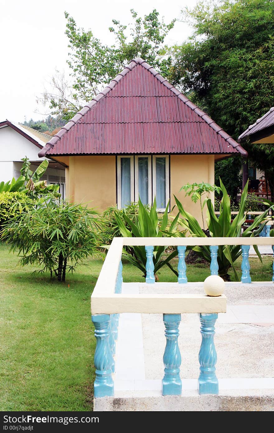 Exterior of a cute bungalow.