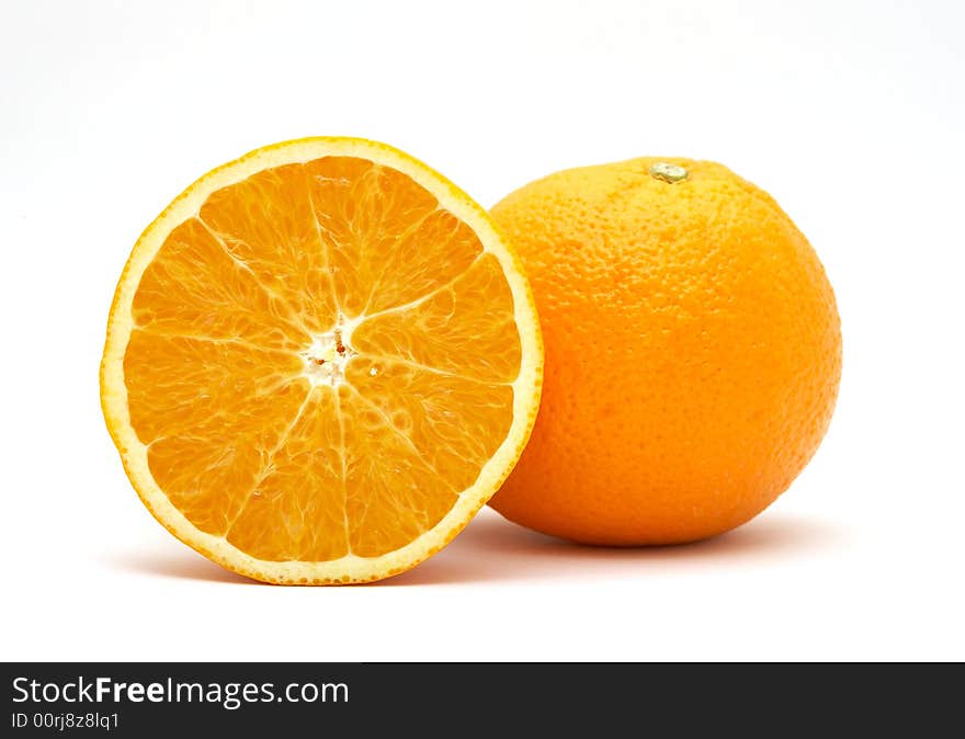 Fresh orange and half isolated on white background. Fresh orange and half isolated on white background