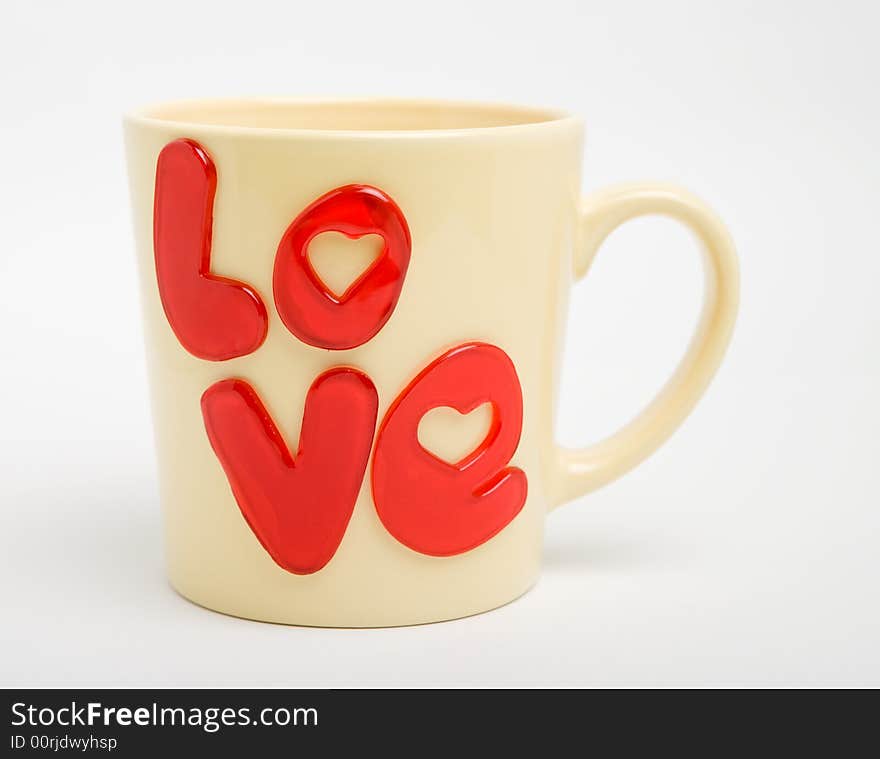 Cup with love-word, isolated