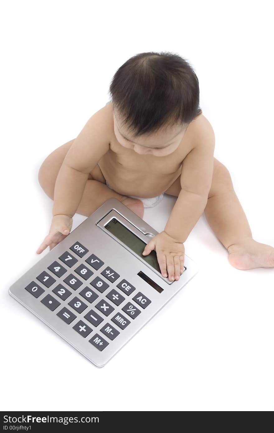 9-month delightful baby with a big pocket calculator  over a white background. 9-month delightful baby with a big pocket calculator  over a white background