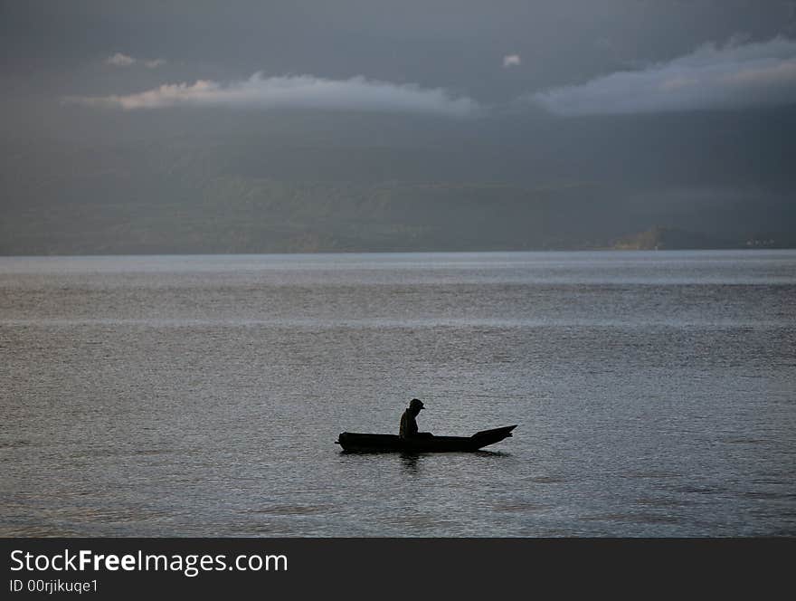 Fisherman on the lake