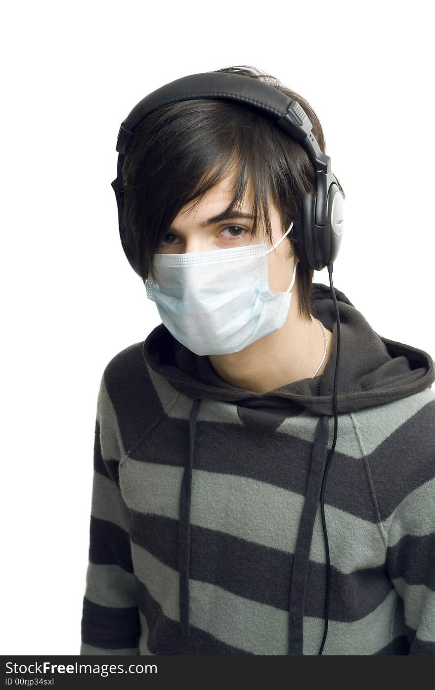 Boy in the mask listens musics. Boy in the mask listens musics