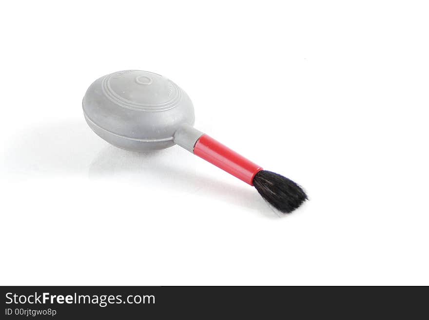 Brush for camera lens