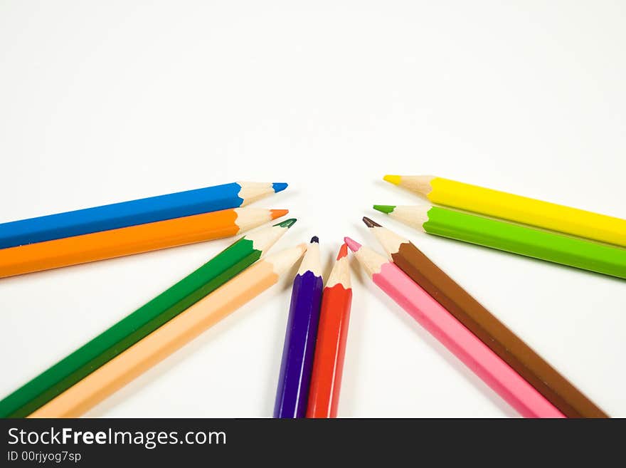 Colored pencils against a white background color