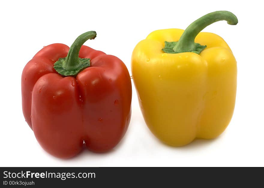 Red and yellow pepper on a white background