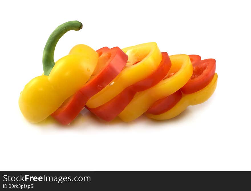 Red and yellow pepper on a white background