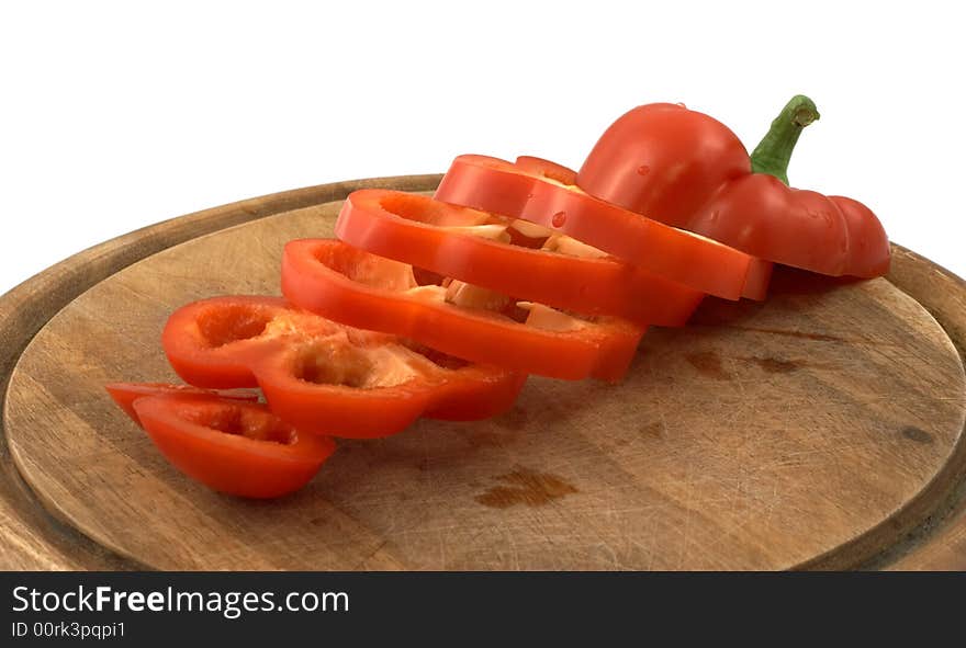 Red and yellow pepper on a white background