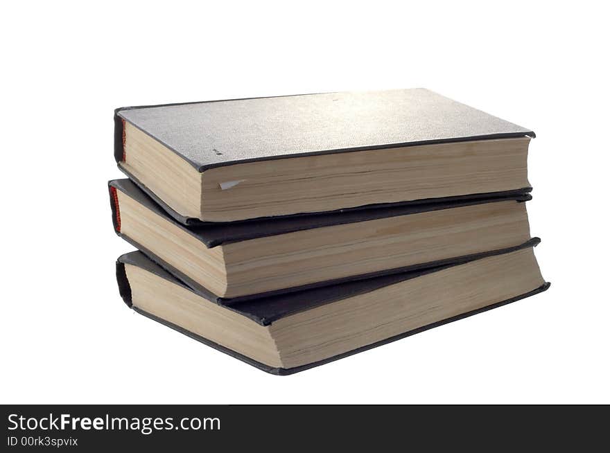 Pile of old books on a white background