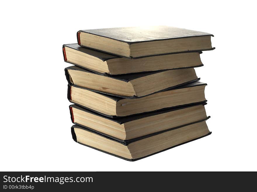 Pile of old books on a white background