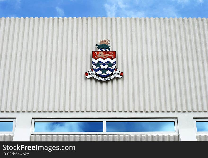 The State Emblem on a Court House facade in George Town, Grand Cayman.