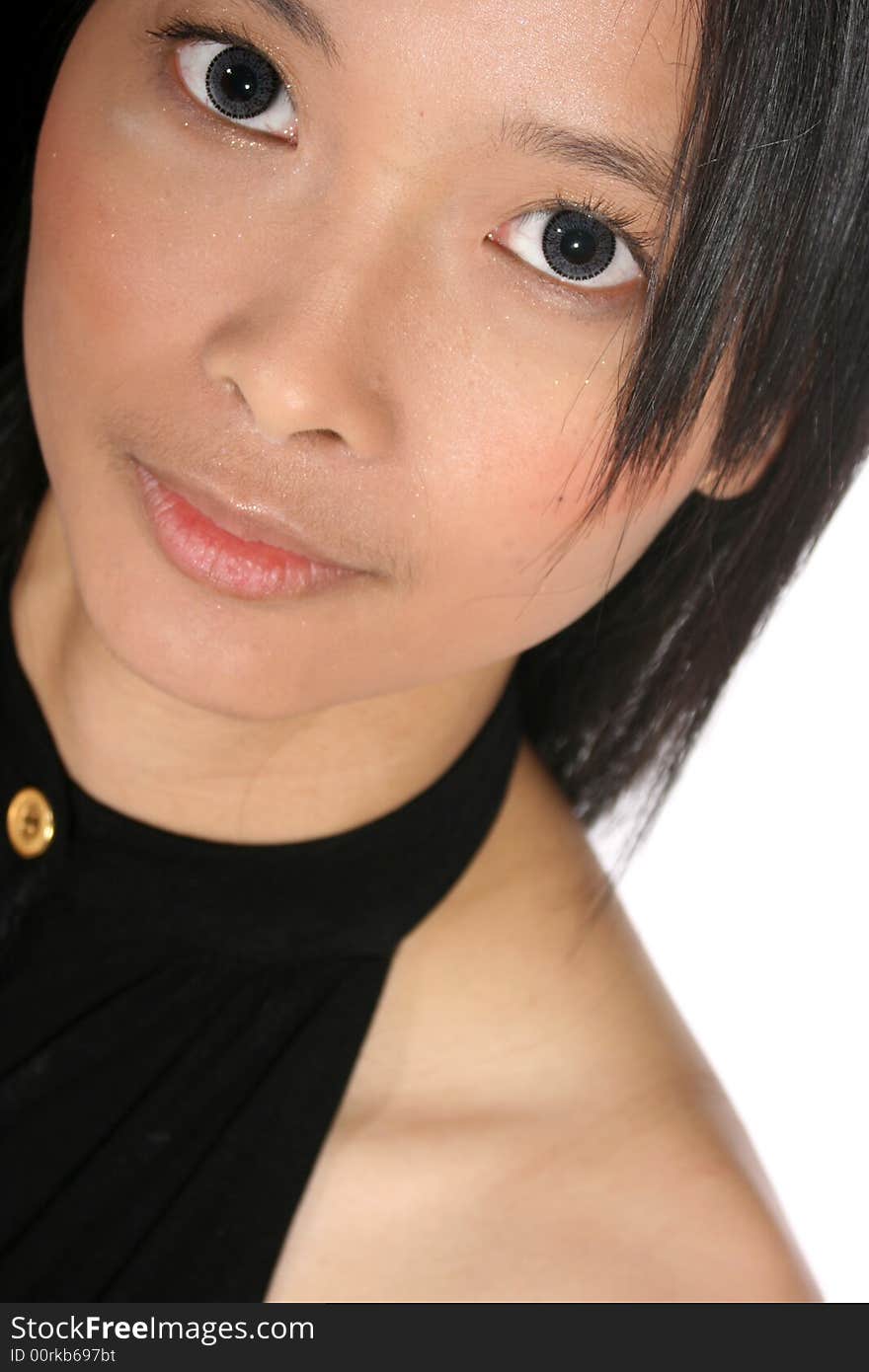 Close-up portrait of beautiful young Asian woman with big grey eyes. Close-up portrait of beautiful young Asian woman with big grey eyes