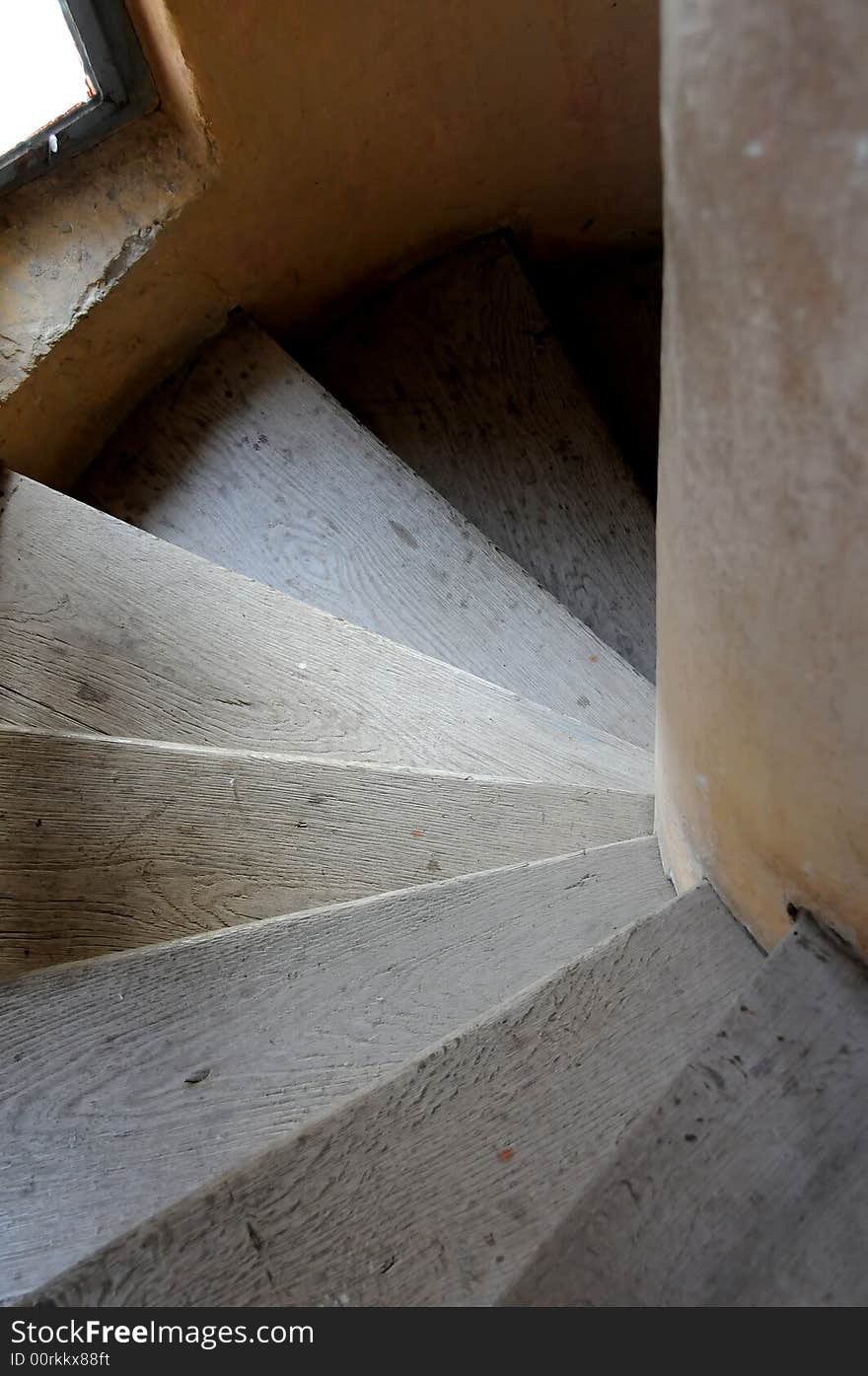 Old wooden spiral stairs in historical building. Old wooden spiral stairs in historical building