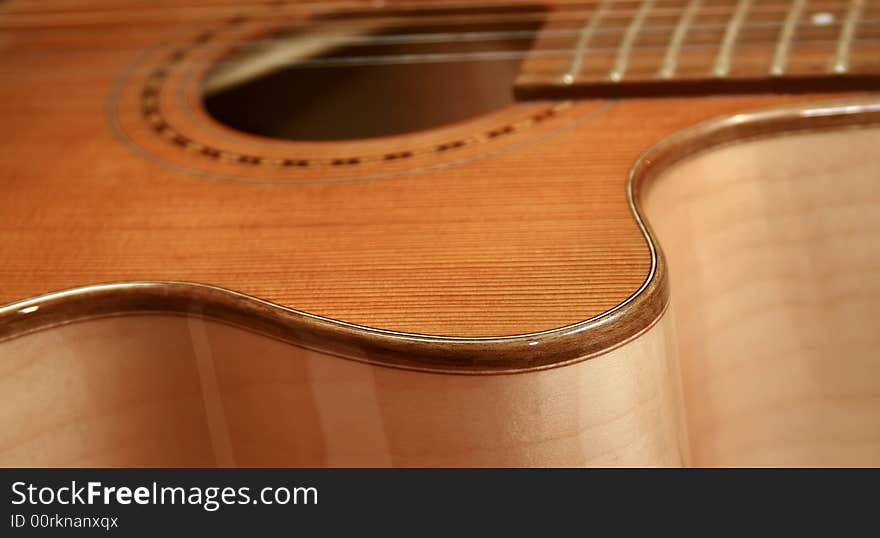 Very beautiful acoustic guitar. A fragment. Very beautiful acoustic guitar. A fragment