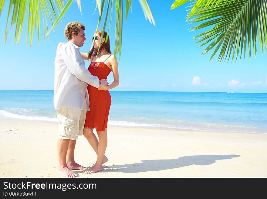 Portrait of attractive couple having date on the beach. Portrait of attractive couple having date on the beach